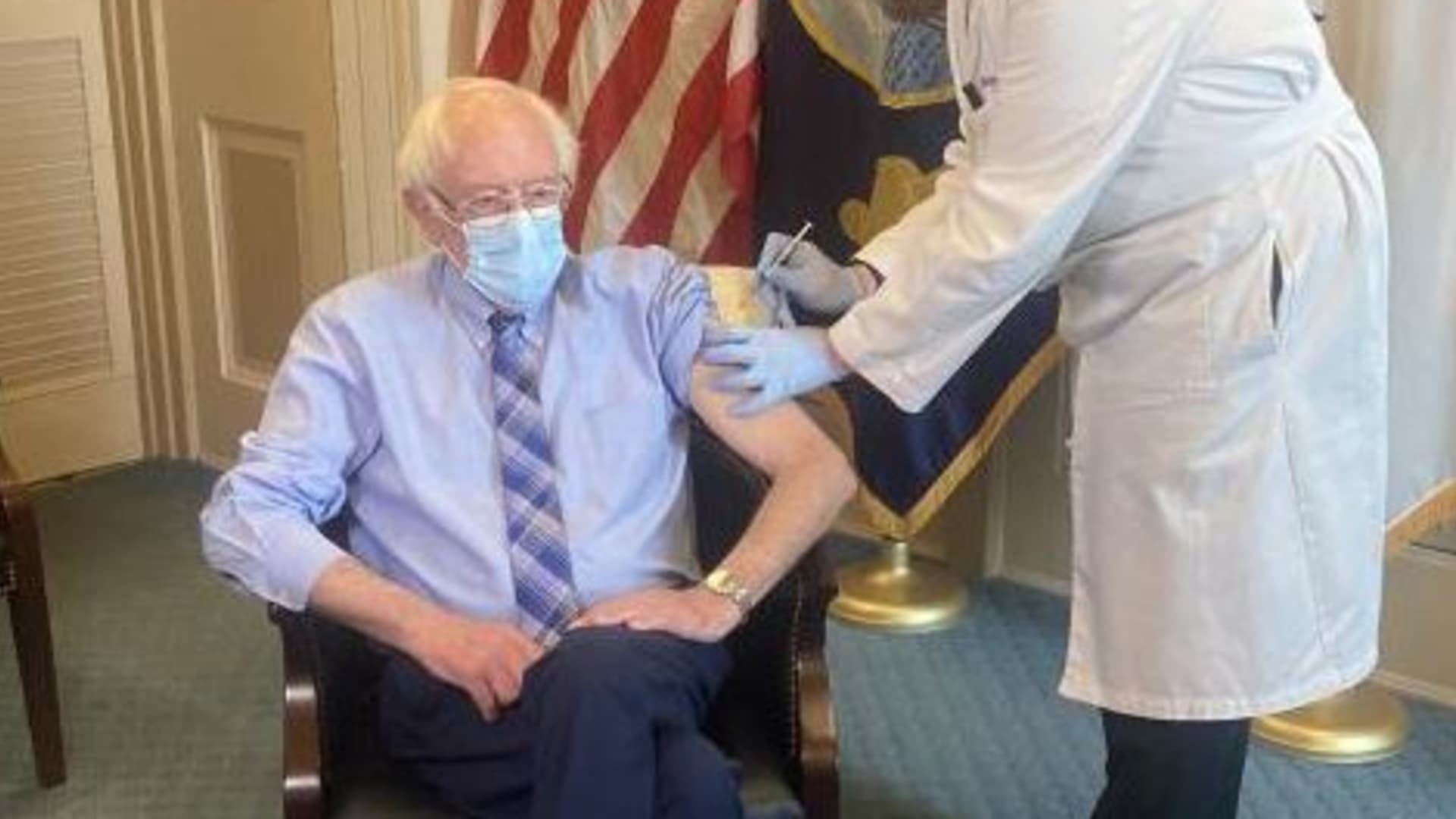 Sen. Bernie Sanders, I-VT, receives a Covid-19 vaccine, Dec. 19, 2020.