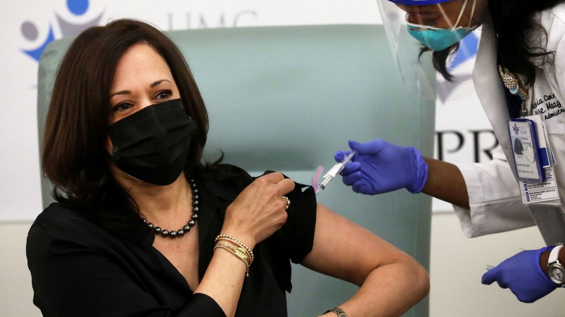 U.S. Vice President-elect Kamala Harris receives a dose of the Moderna COVID-19 vaccine at United Medical Center in Washington, December 29, 2020.