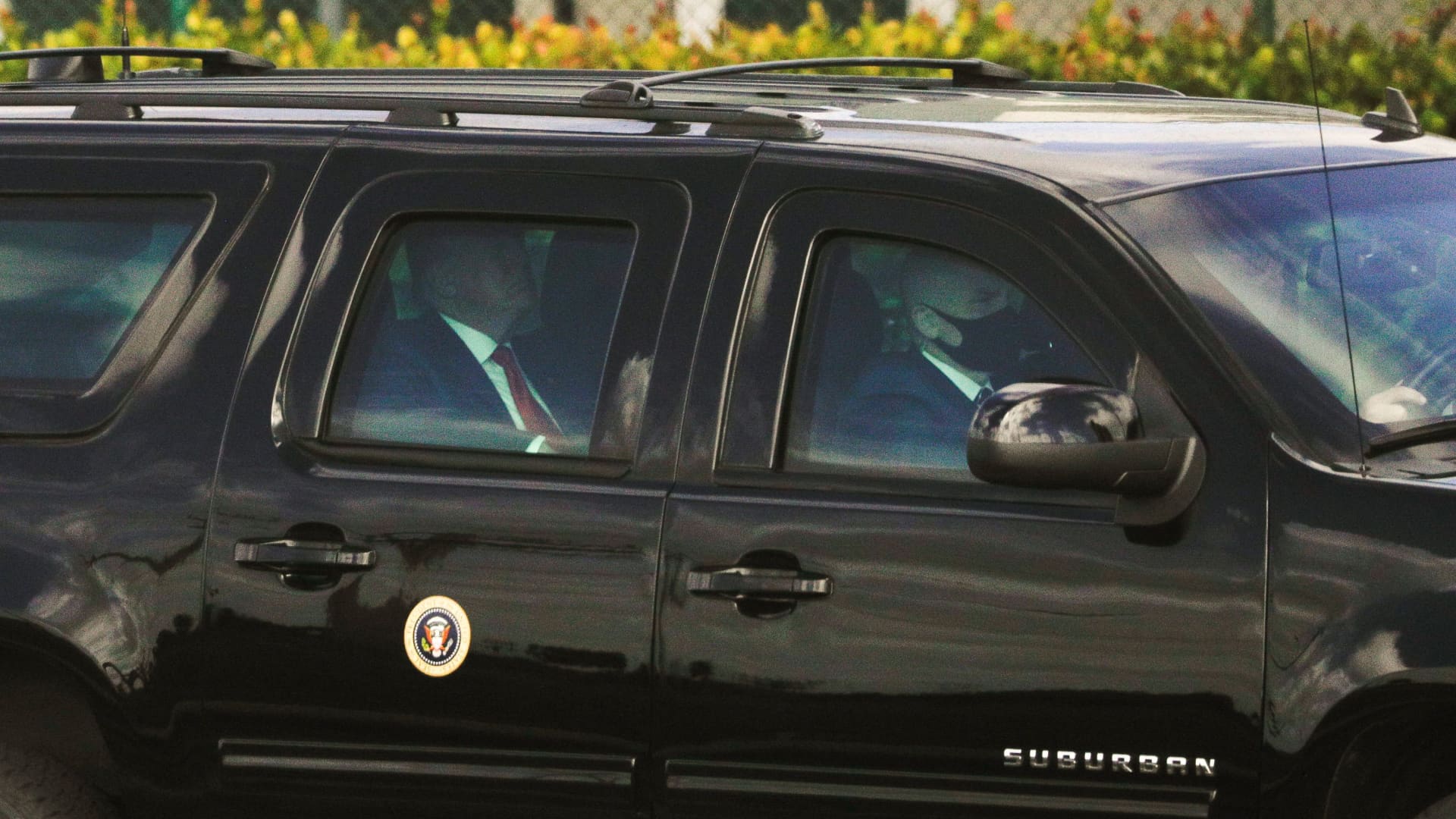 U.S. President Donald Trump is pictured inside of his armoured vehicle while departing his Mar-a-Lago resort in West Palm Beach, Florida, U.S., December 31, 2020.