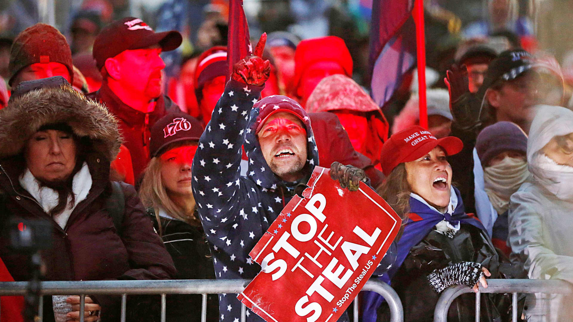 Supporters of U.S. President Donald Trump gather at a rally at Freedom Plaza, ahead of the U.S. Congress certification of the November 2020 election results, during protests in Washington, January 5, 2021.