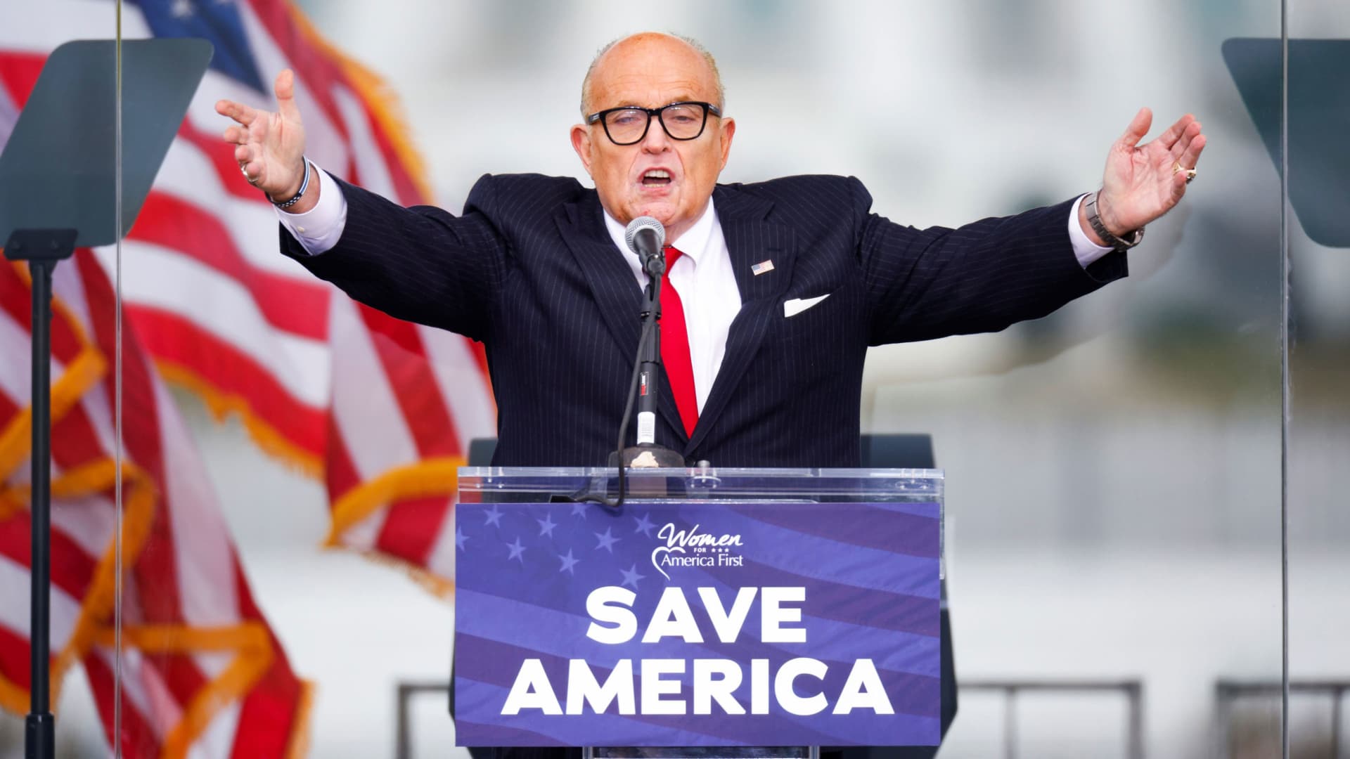 U.S. President Donald Trump's personal lawyer Rudy Giuliani gestures as he speaks as Trump supporters gather by the White House ahead of his speech to contest the certification by the U.S. Congress of the results of the 2020 U.S. presidential election in Washington, U.S, January 6, 2021.