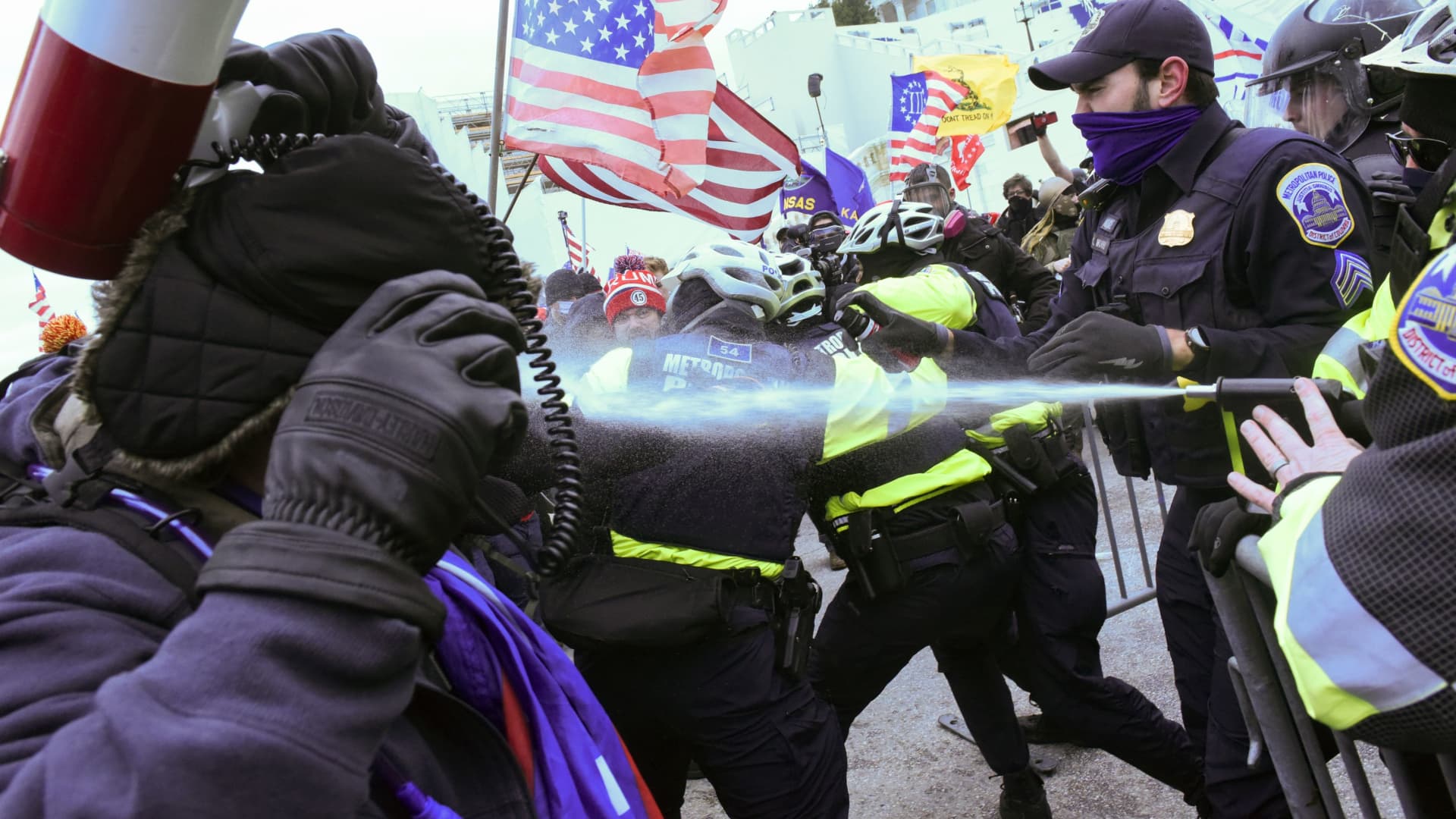 Supporters of U.S. President Donald Trump clash with police officers in front of the U.S. Capitol Building in Washington, U.S. January 6, 2021.