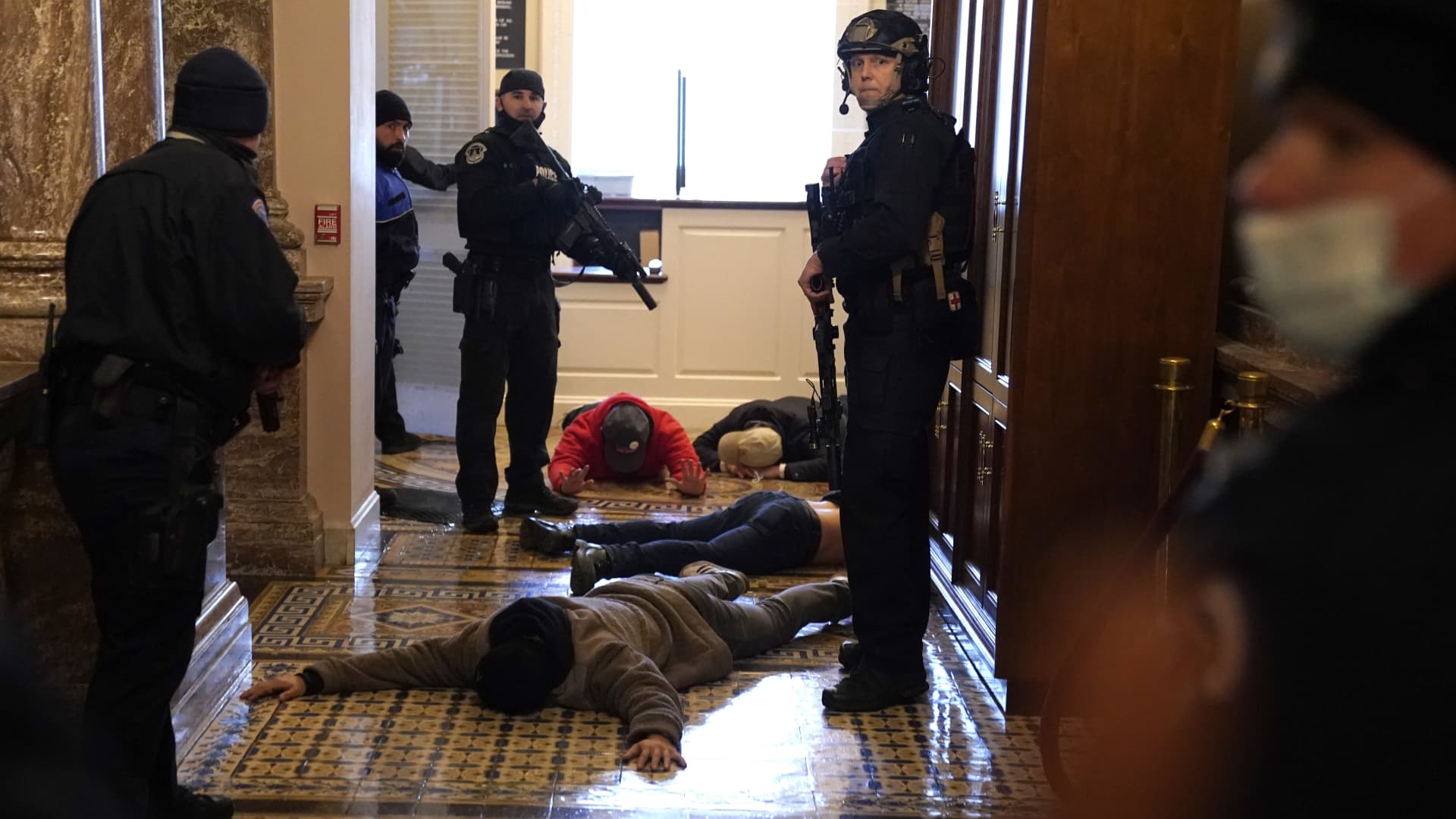 U.S. Capitol Police stand detain protesters outside of the House Chamber during a joint session of Congress on January 06, 2021 in Washington, DC.