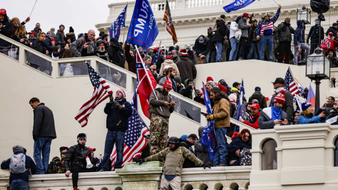 Photos show violent clashes as Trump supporters storm the U.S. Capitol