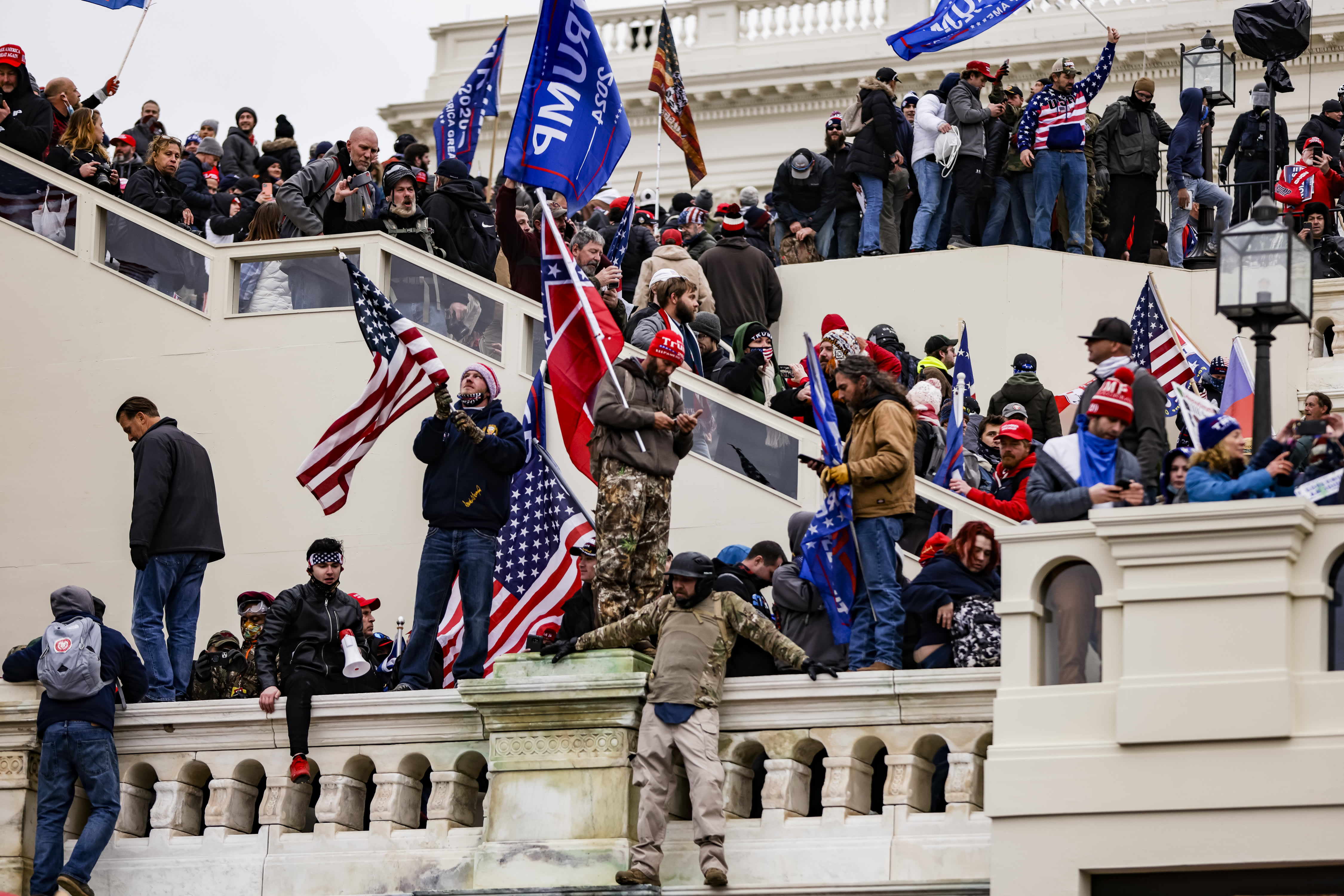Photos show violent clashes as Trump supporters storm the U.S. Capitol