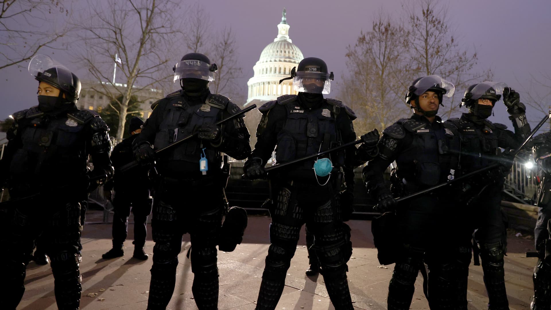 Police officers in riot gear line up as protesters gather on the U.S. Capitol Building on January 06, 2021 in Washington, DC.