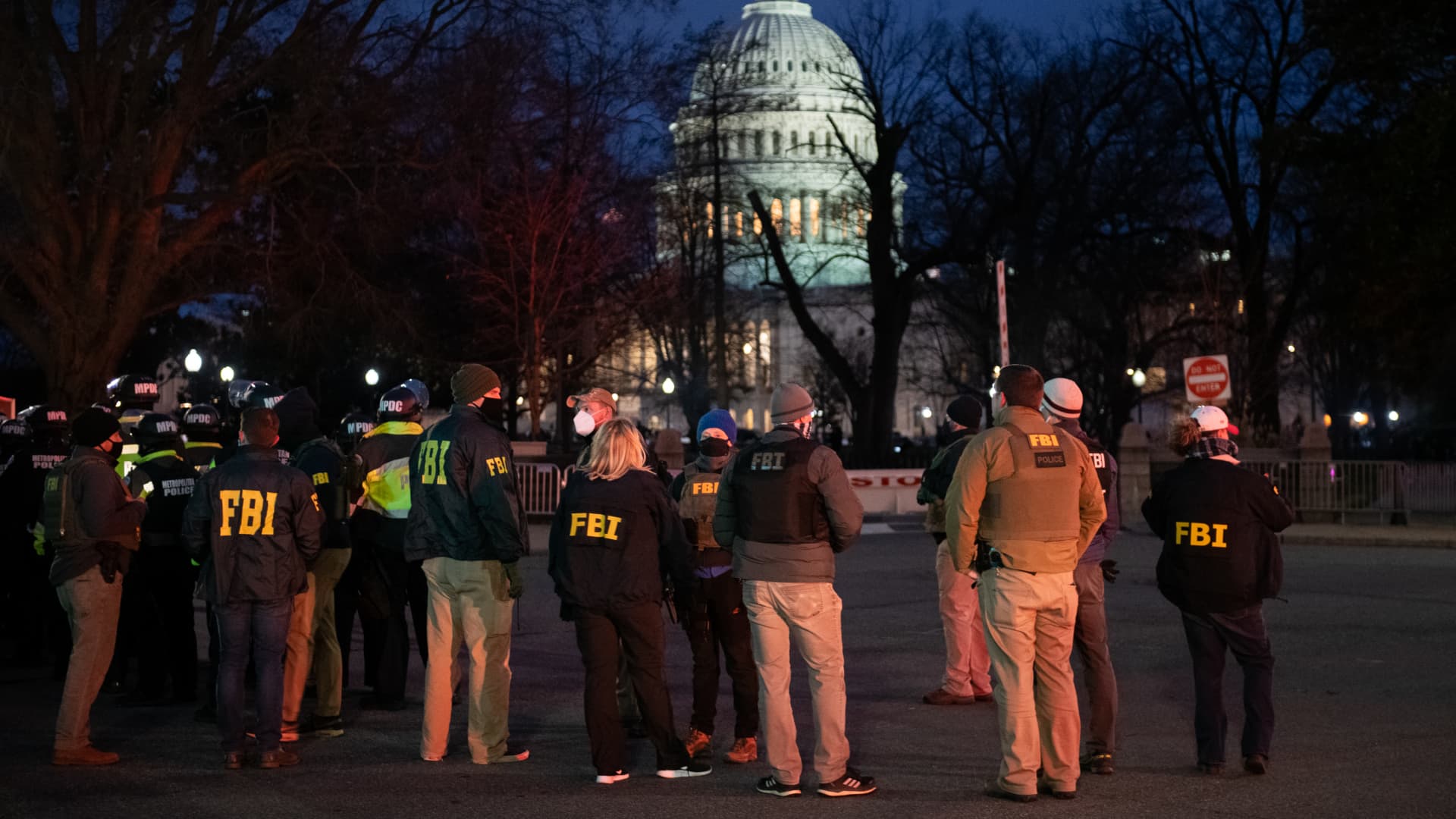 Federal Bureau of Investigation (FBI) agents arrive at Capitol Hill in Washington, D.C., U.S., on Jan. 6, 2021.
