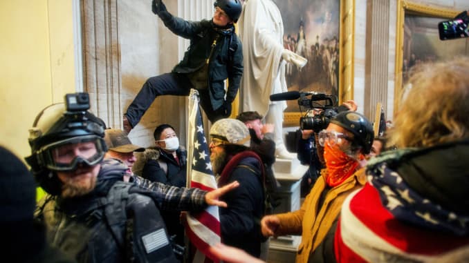 Pro-Trump protesters storm the U.S. Capitol to contest the certification of the 2020 U.S. presidential election results by the U.S. Congress, at the U.S. Capitol Building in Washington, D.C., January 6, 2021.