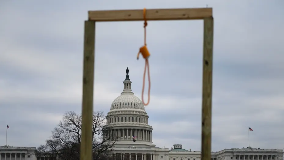 A noose is seen on makeshift gallows as supporters of US President Donald Trump gather on the West side of the US Capitol in Washington DC on January 6, 2021.