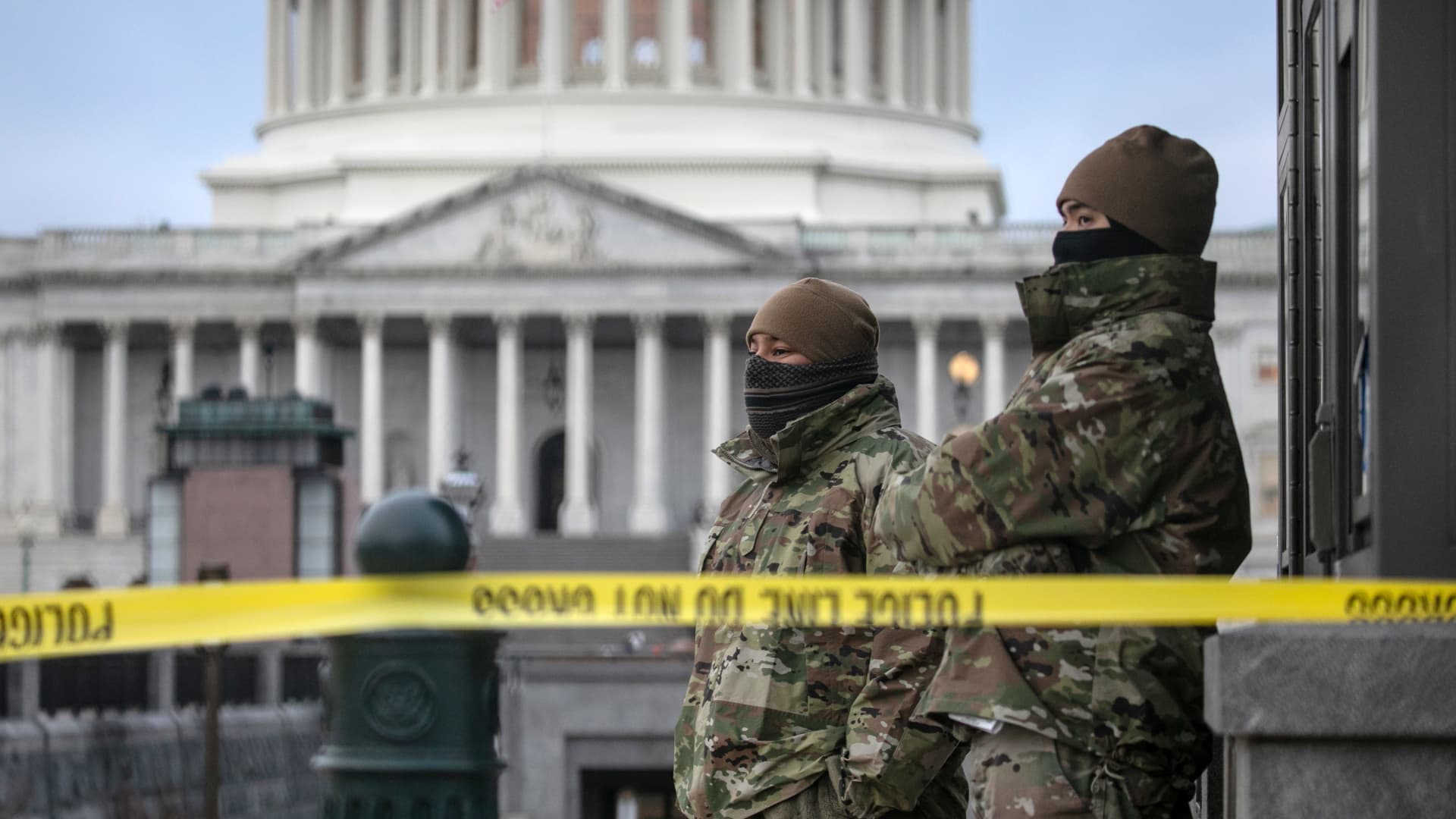 DC National Guard troops stand watch at the U.S. Capitol on January 08, 2021 in Washington, DC. Fencing was put up around the building the day before, following the storming of the Capitol by Trump supporters on January 6.