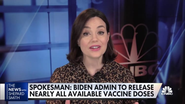Biden says he will release nearly all available vaccine doses right away