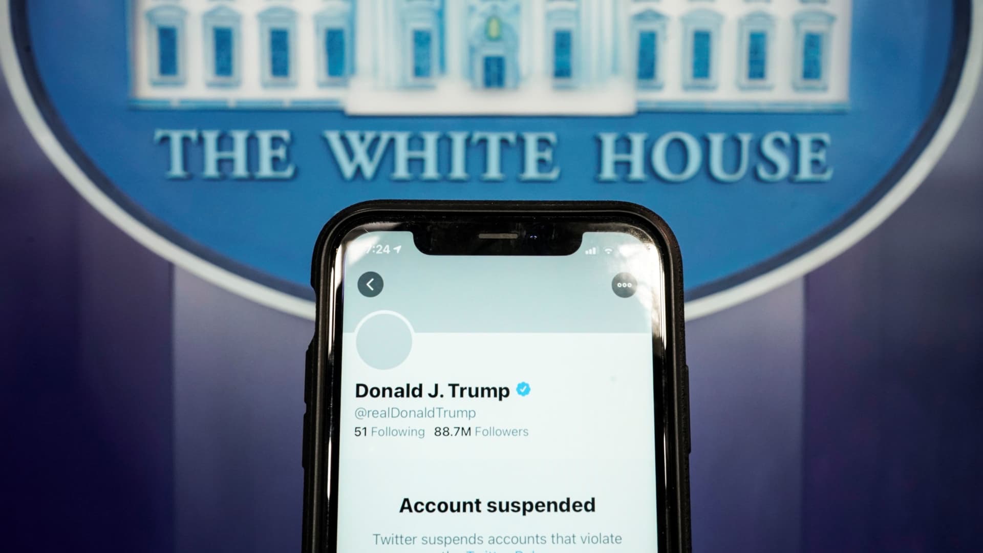 A photo illustration shows the suspended Twitter account of U.S. President Donald Trump on a smartphone at the White House briefing room in Washington, U.S., January 8, 2021.