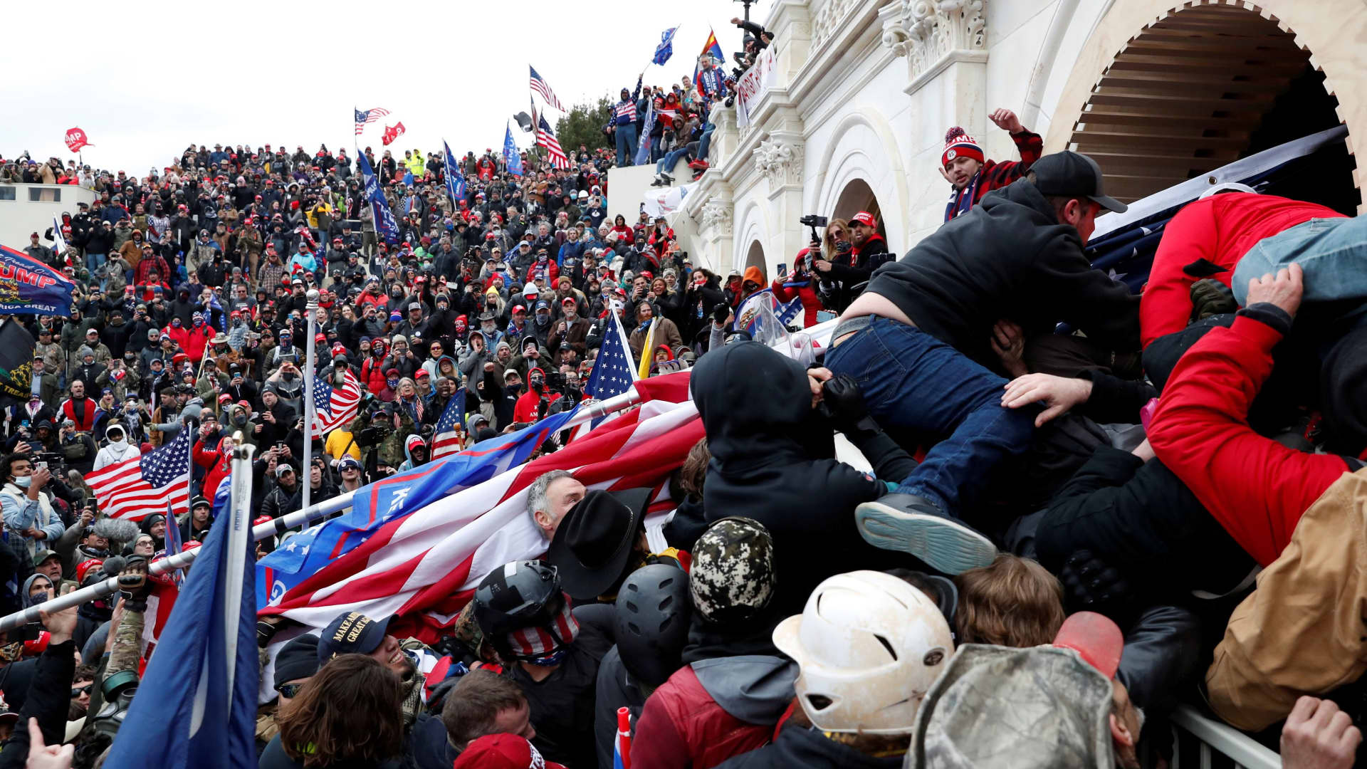 Pro-Trump protesters storm into the U.S. Capitol during clashes with police, during a rally to contest the certification of the 2020 U.S. presidential election results by the U.S. Congress, in Washington, U.S, January 6, 2021.
