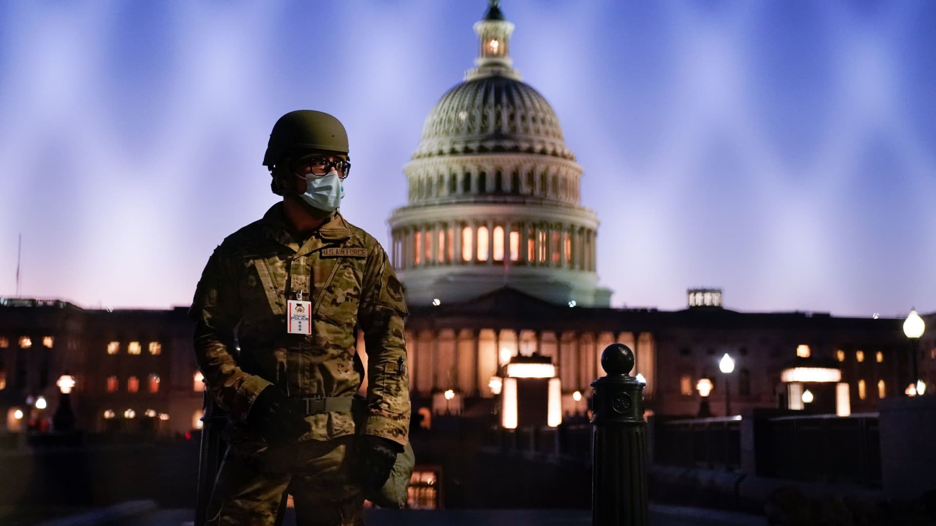 Members of the National Guard gather at the U.S. Capitol as the House of Representatives prepares to begin the voting process on a resolution demanding U.S. Vice President Pence and the cabinet remove President Trump from office, in Washington, January 12, 2021.