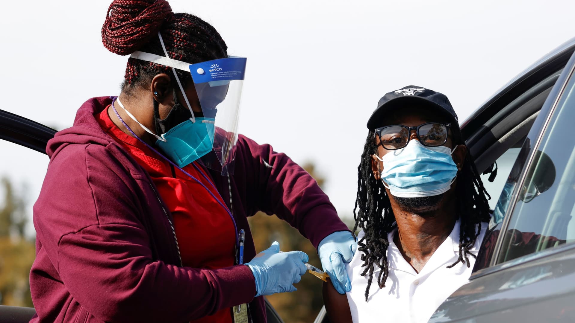 Nurse Dawn Duran administers a dose of the Moderna COVID-19 vaccine to Jeremy Coran during the outbreak of the coronavirus disease (COVID-19), in Pasadena, California, U.S., January 12, 2021.
