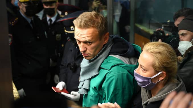 Russian opposition leader Alexei Navalny and his wife Yulia are seen at the passport control point at Moscow's Sheremetyevo airport on January 17, 2021.