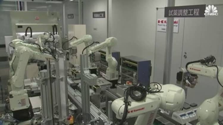 Japan uses robots to speed up Covid-19 testing ahead of the Olympics