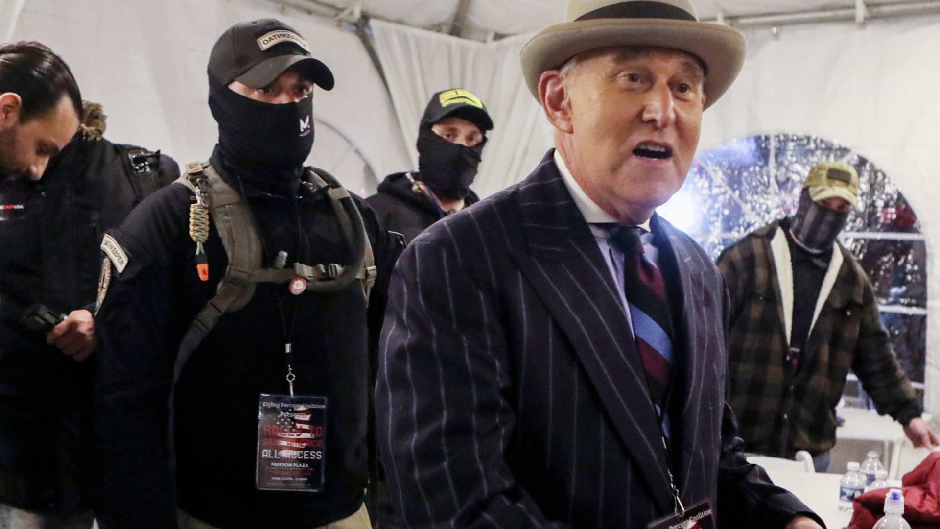 Members of the Oath Keepers provide security to Roger Stone at a rally the night before groups attacked the U.S. Capitol, in Washington, U.S., January 5, 2021.