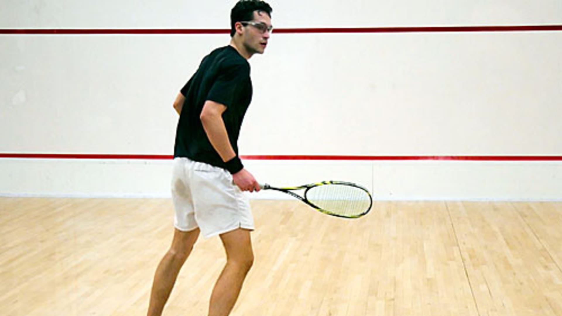 Will Ahmed playing squash at Harvard.