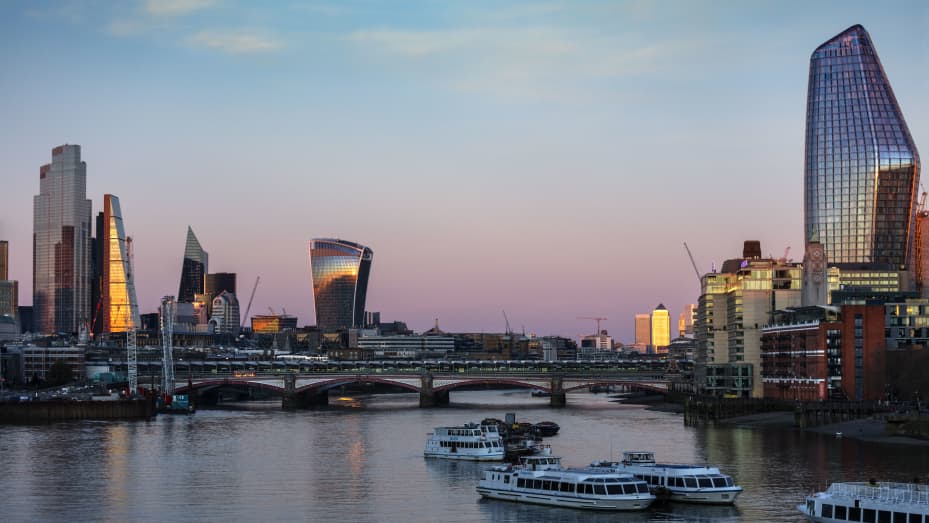 The evening light on the skyline of buildings on the River Thames, on 4th April 2020 in London, United Kingdom.