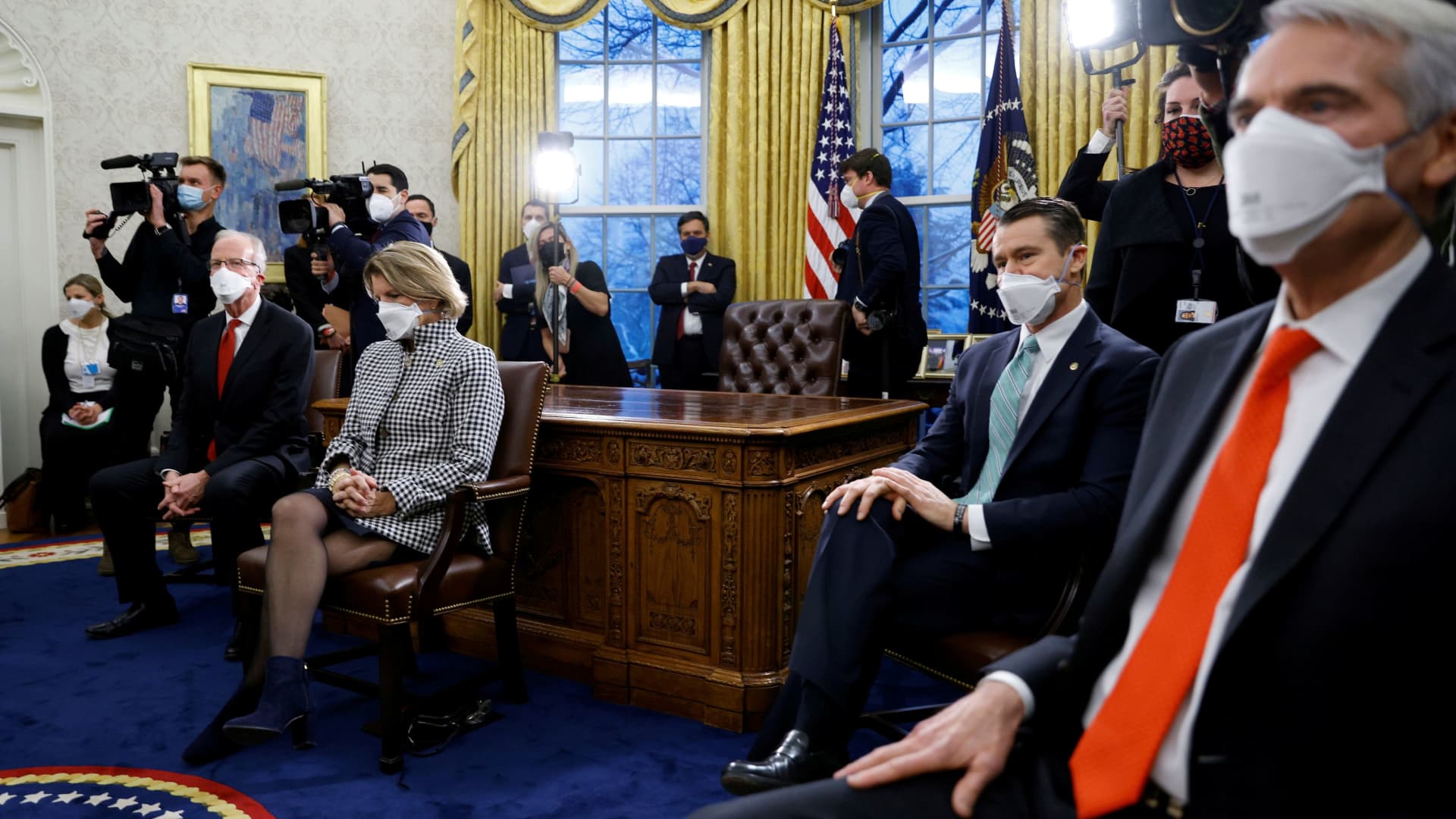 Republican senators look on during a meeting with U.S. President Joe Biden and Vice President Kamala Harris, not pictured, to discuss coronavirus disease (COVID-19) federal aid legislation inside the Oval Office at the White House in Washington, U.S., February 1, 2021.