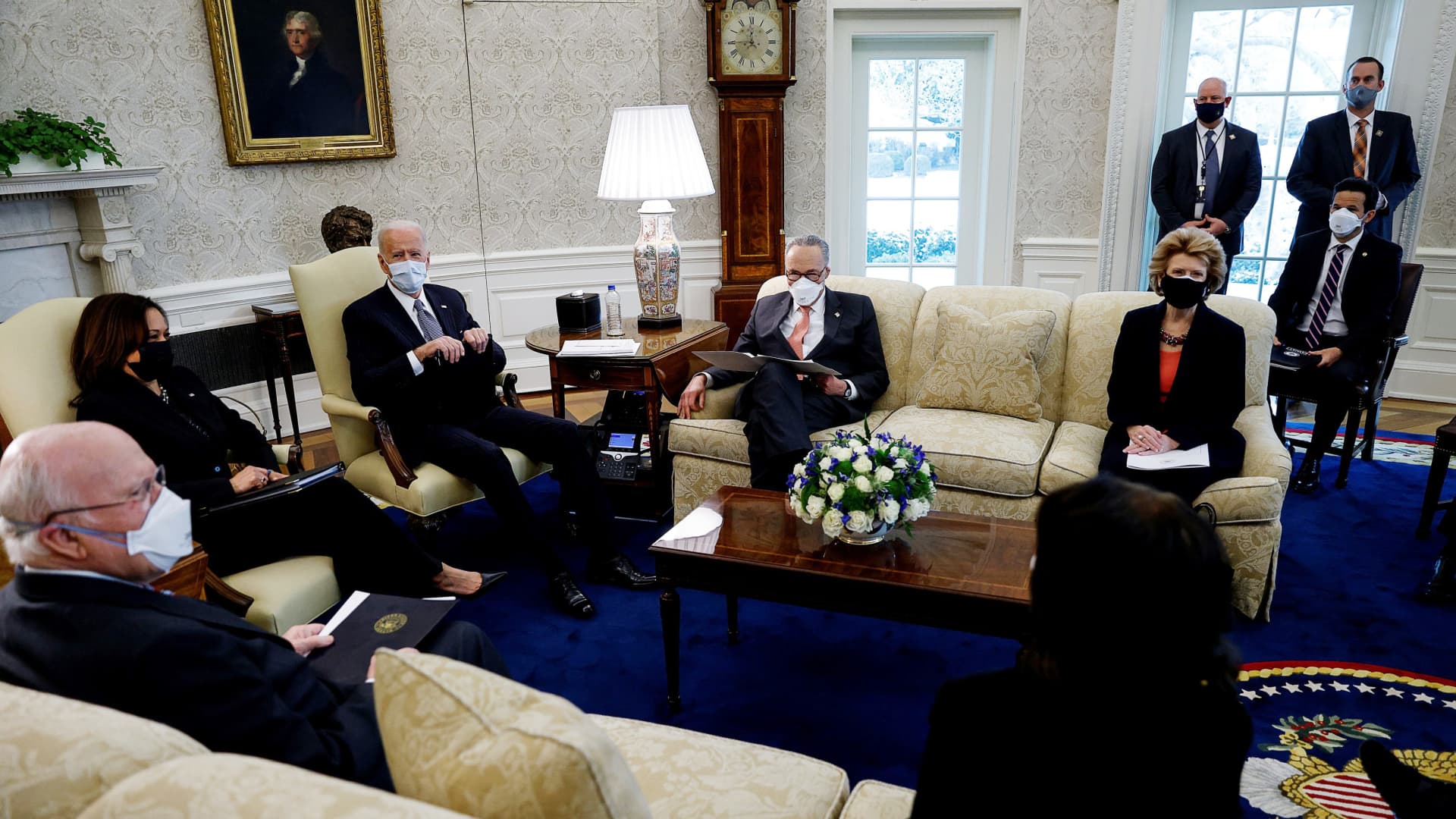 President Joe Biden and Vice President Kamala Harris discuss coronavirus aid legislation with Democratic senators during a meeting in the Oval Office at the White House in Washington, U.S., February 3, 2021.