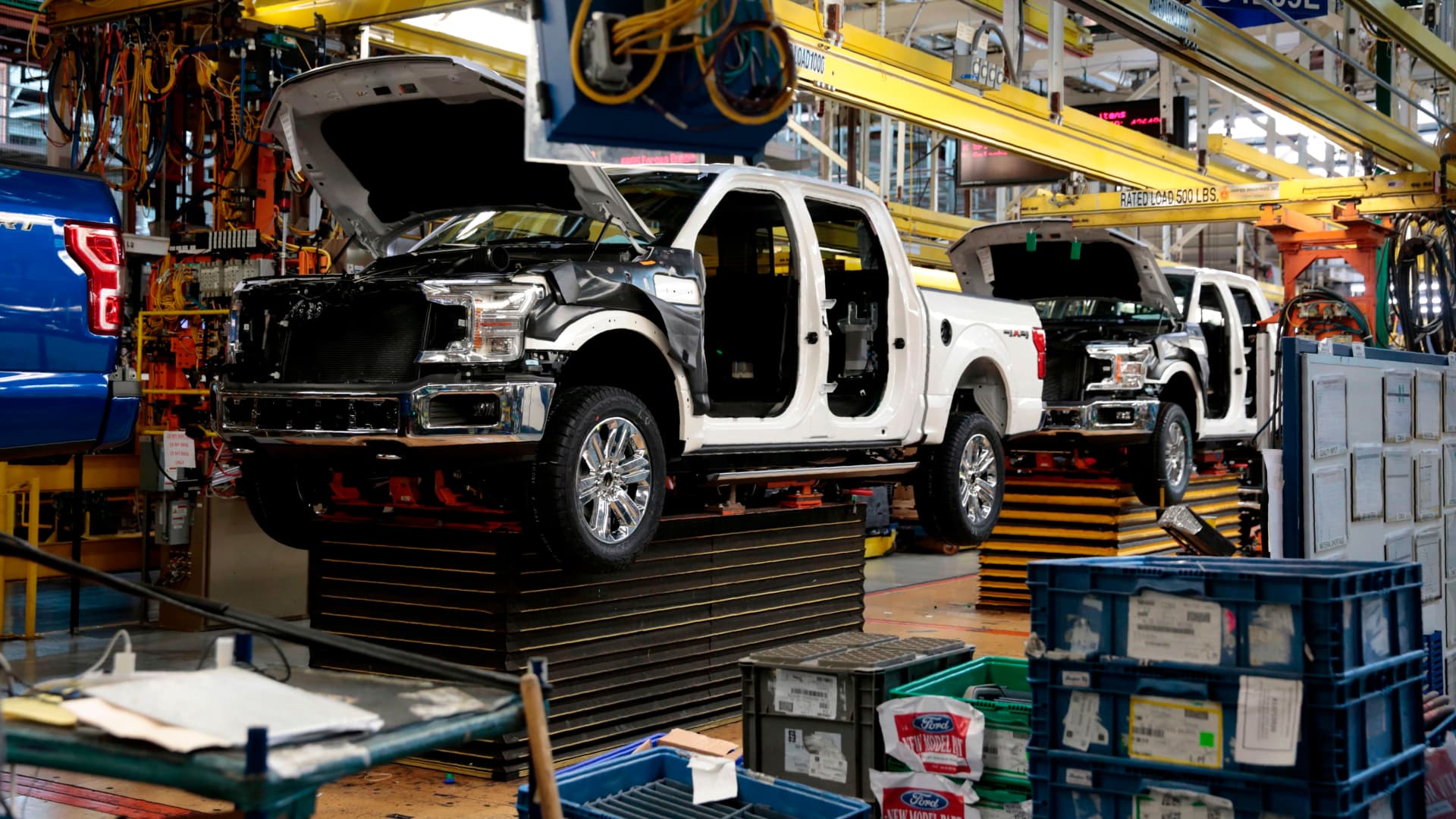 This photo shows Ford 2018 and 2019 F-150 trucks on the assembly line at the Ford Motor Company's Rouge Complex on September 27, 2018 in Dearborn, Michigan.