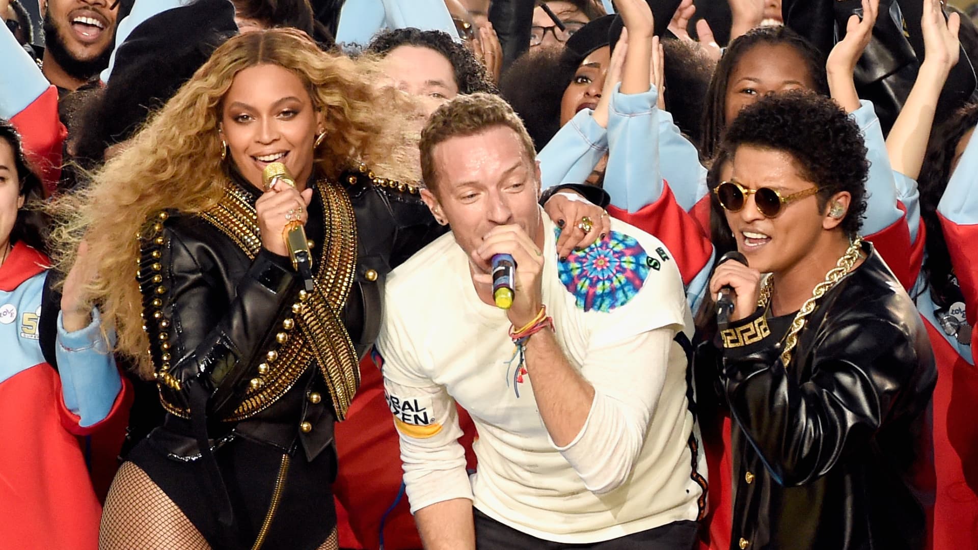 (L-R) Beyonce, Chris Martin of Coldplay and Bruno Mars perform onstage during the Pepsi Super Bowl 50 Halftime Show at Levi's Stadium on February 7, 2016 in Santa Clara, California.(Photo by Kevin Mazur/WireImage)