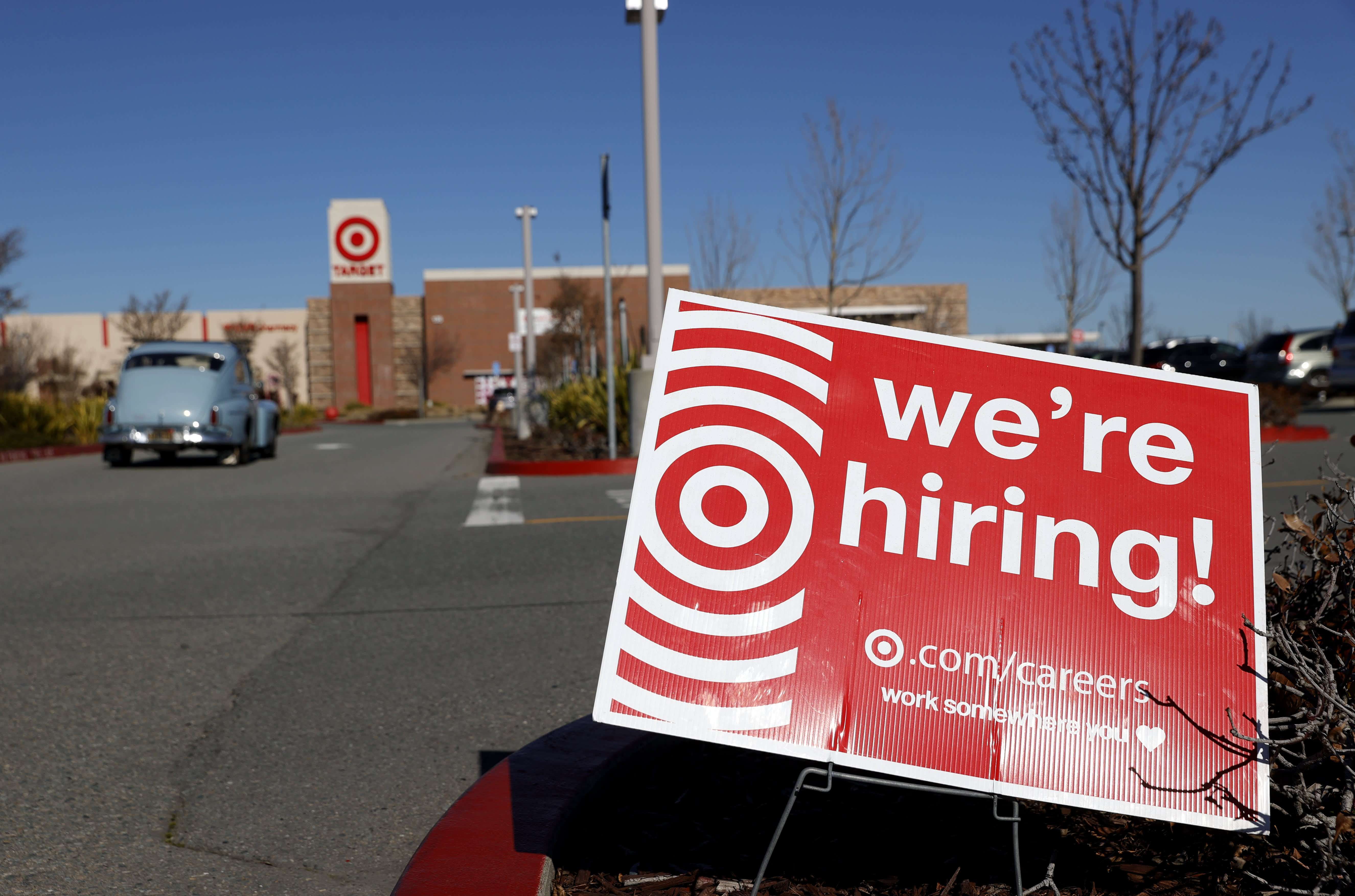 Target said Wednesday it will offer new perks to woo workers: a debt-free way to get a college degree and payments toward graduate programs. Starting 