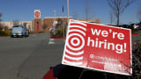 A hiring sign is posted i front of a Target store on February 05, 2021 in San Rafael, California.