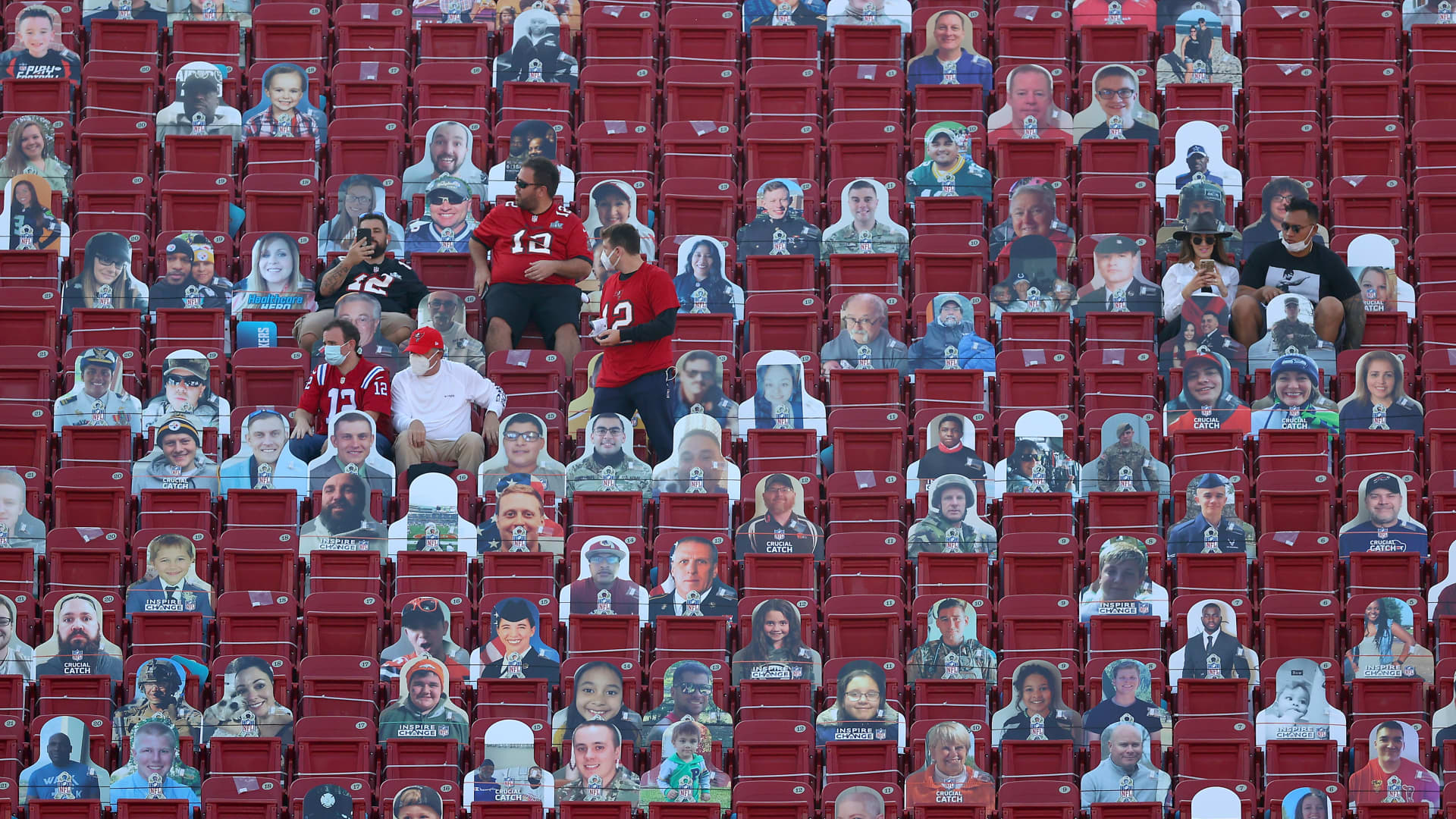 Fans sit among cardboard cutouts before Super Bowl LV between the Tampa Bay Buccaneers and the Kansas City Chiefs at Raymond James Stadium on February 07, 2021 in Tampa, Florida.