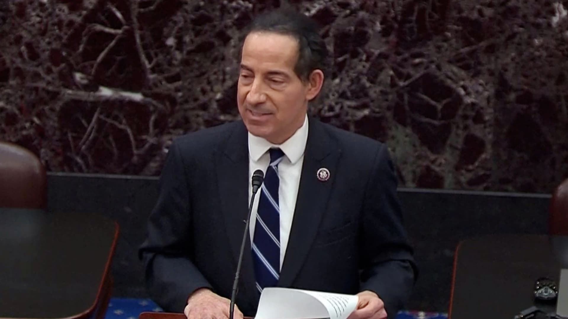 House lead impeachment manager Jamie Raskin (D-MD) reads the House article of impeachment against former President Donald Trump on accusations of inciting the January 6 attack on the Capitol, on the floor of the U.S. Senate in this frame grab from video shot at the U.S. Capitol in Washington, U.S., January 25, 2021.
