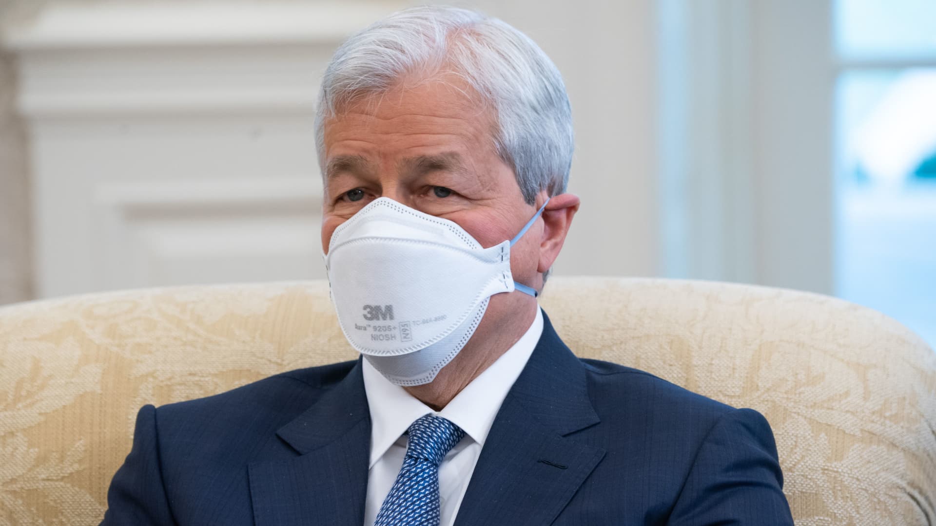 Jamie Dimon, Chairman and CEO of JPMorgan Chase, attends a meeting hosted by US President Joe Biden with business leaders about a Covid-19 relief bill in the Oval Office of the White House in Washington, DC, February 9, 2021.