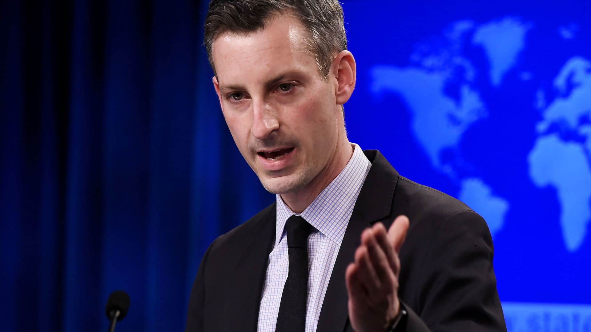 U.S. State Department spokesman Ned Price answers a question during a news briefing at the department in Washington, February 9, 2021.