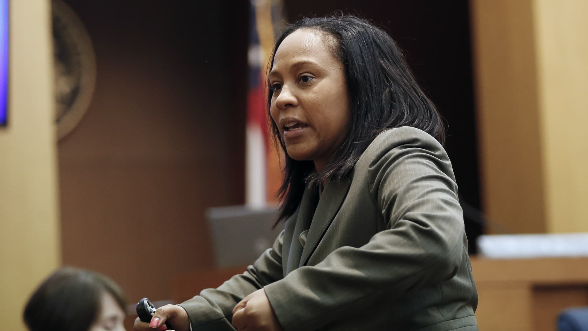 In this Wednesday, Aug. 24, 2016, file photo, Fulton County Deputy District Attorney Fani Willis makes her closing arguments during a trial in Atlanta.