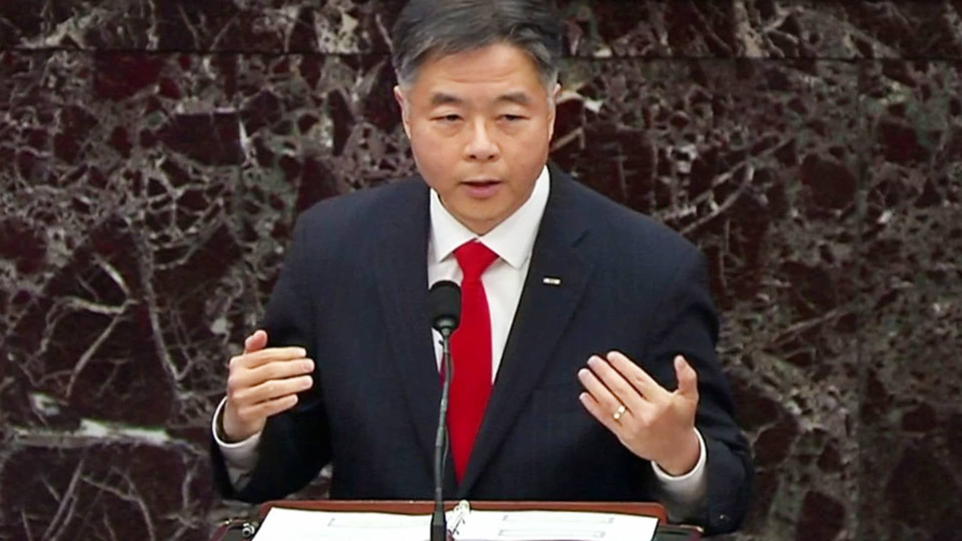 U.S. House impeachment manager Rep. Ted Lieu (D-CA) delivers part of the impeachment managers’ opening argument in the impeachment trial of former President Donald Trump, on charges of inciting the deadly attack on the U.S. Capitol, on the floor of the Senate chamber on Capitol Hill in Washington, February 10, 2021.