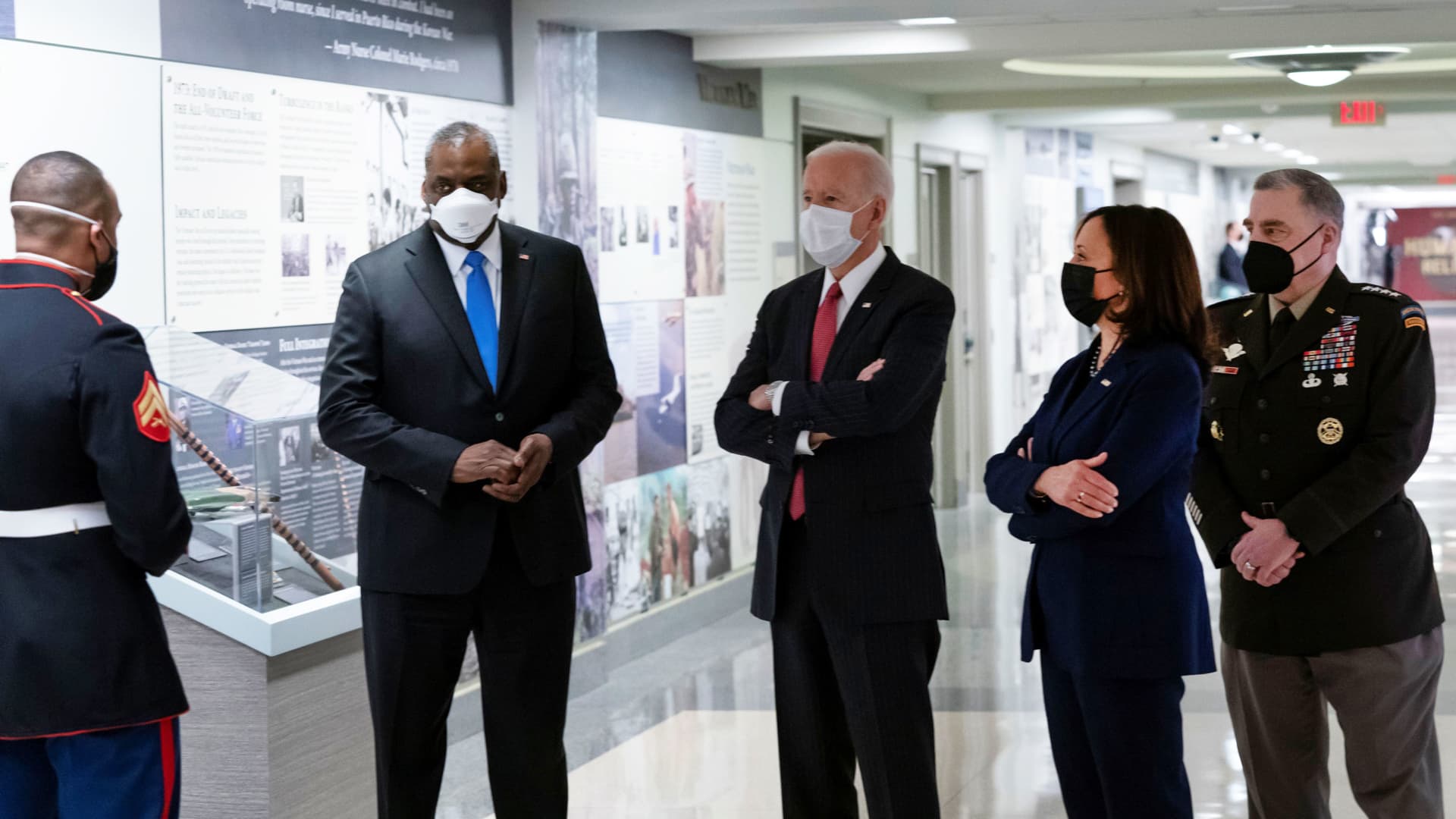 U.S. President Joe Biden, accompanied by Vice President Kamala Harris, Secretary of Defense Lloyd Austin, and Joint Chiefs of Staff Chairman Gen. Mark Milley, tours the African Americans in Defense of our Nations Corridor at the Pentagon in Arlington, Virginia, February 10, 2021.