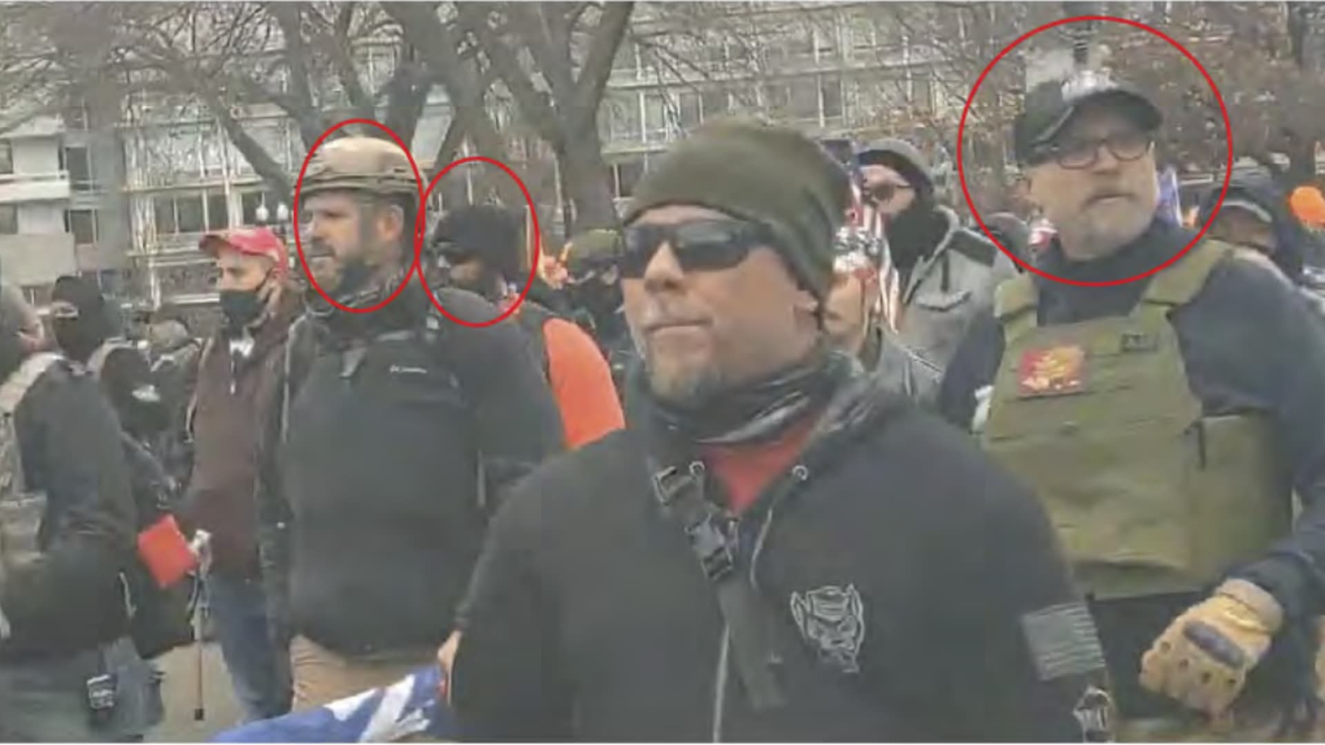 Photo included in a U.S. District Court Criminal Complaint naming participants in the U.S. Capitol Riot on Jan. 6, 2021. Circled in red participants are identified as Christopher Kuehne (L), Louis Enrique Colon (C), and William Chrestman (R)
