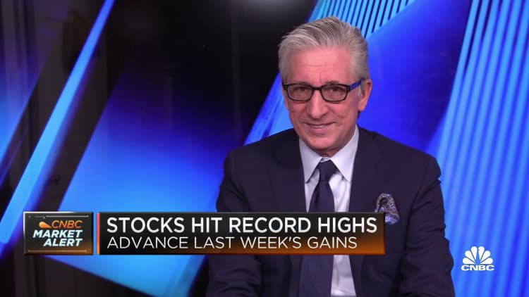Stocks extend last week's gains and reach record highs at open