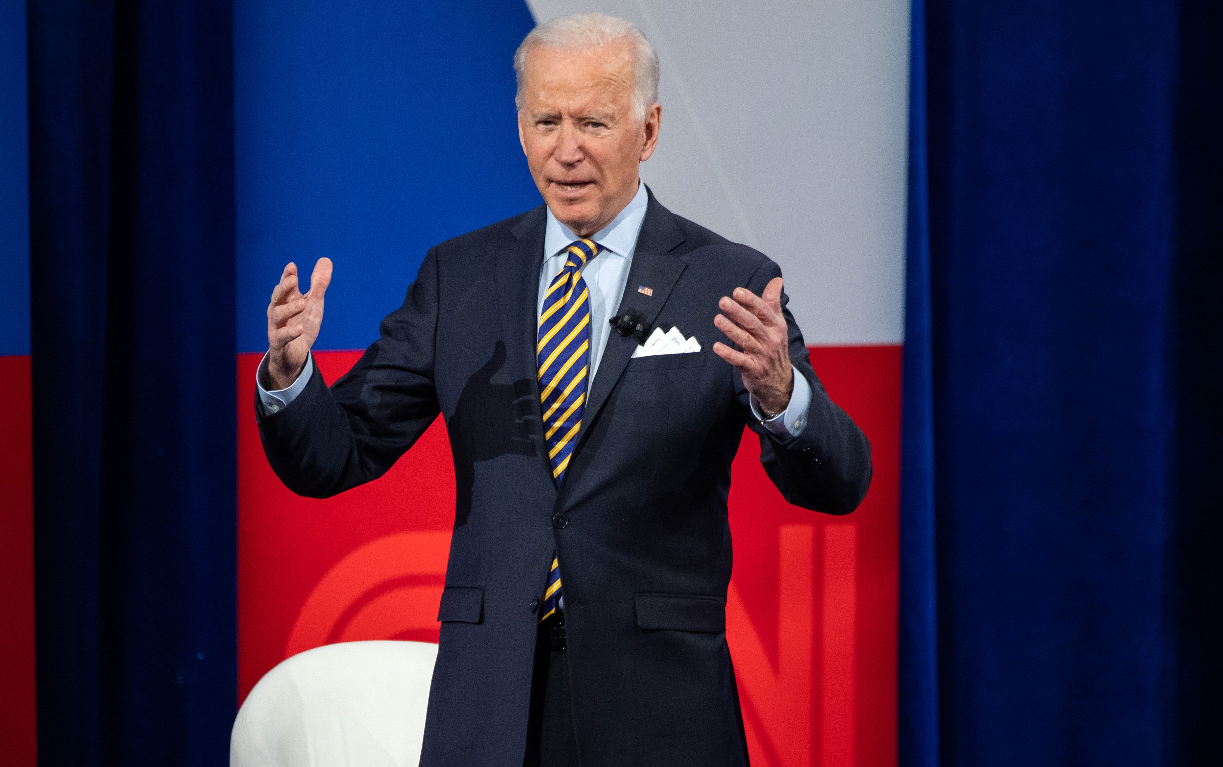 Biden sends Trump – ‘the former guy’ – away in Covid relief ground