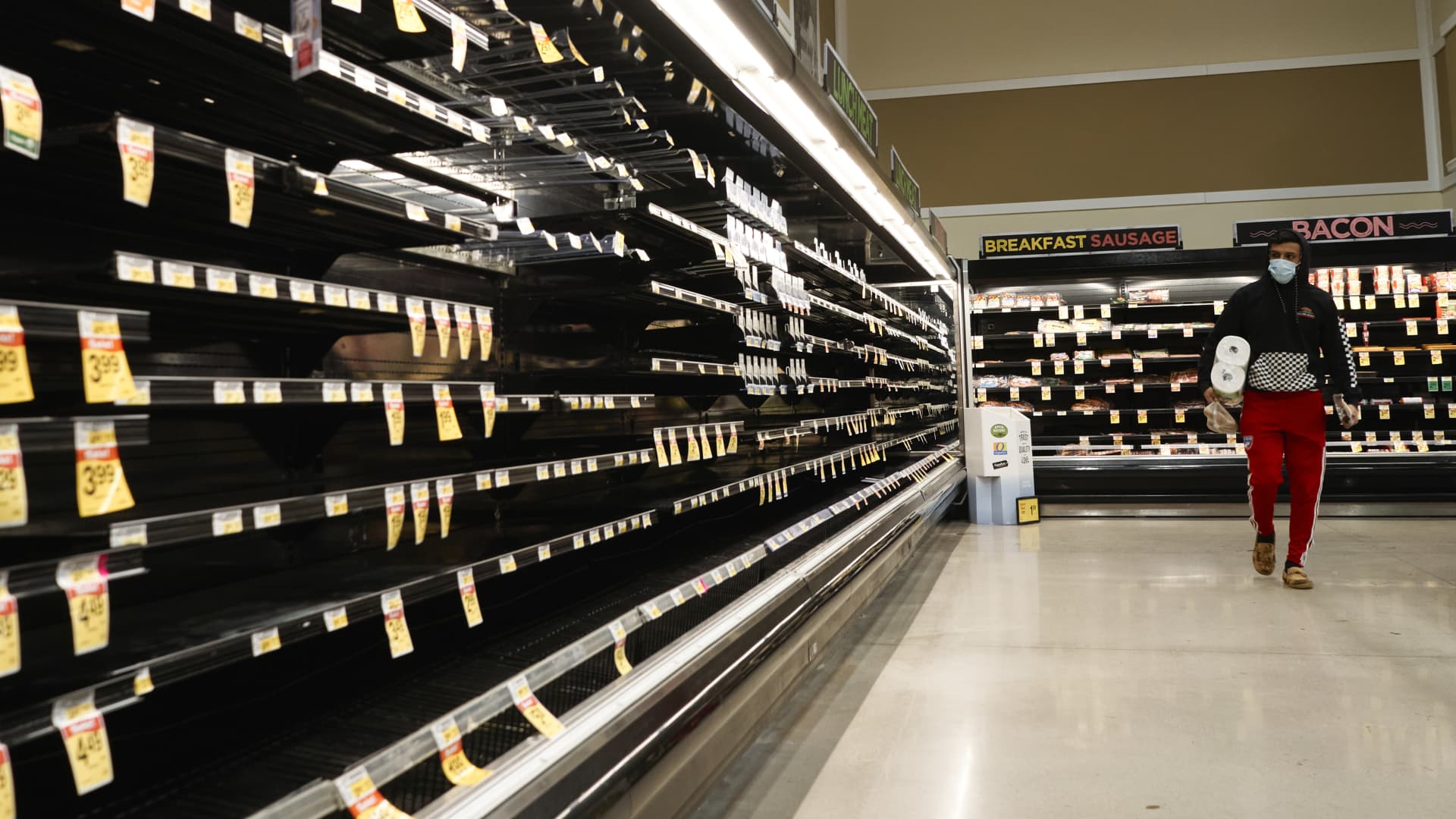 Empty shelves in the meat aisle at a grocery store in McKinney, Texas, U.S., on Wednesday, Feb. 17, 2021.
