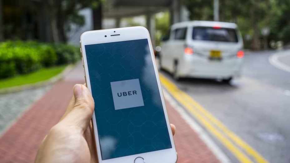 An iPhone displays the Uber ride-hailing app on 26 September 2017, in Hong Kong.