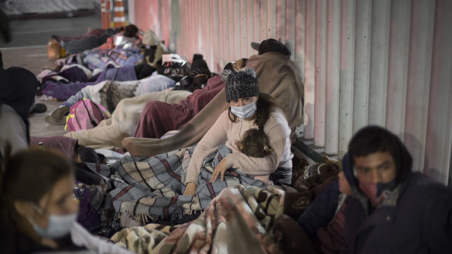 Dozens of migrants of Central American and Mexican origin sleep on the esplanade of the National Institute of Migration near the El Chaparral border crossing, waiting for U.S. authorities to let them enter to begin their humanitarian asylum process in this country.
