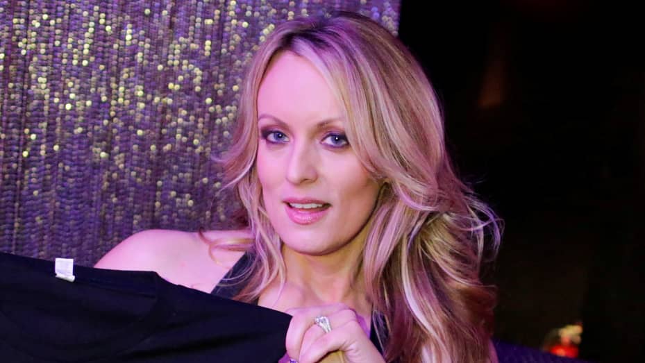 Adult-film actress Stephanie Clifford, also known as Stormy Daniels, poses for pictures at the Gossip Gentleman club in Long Island, New York, February 23, 2018.