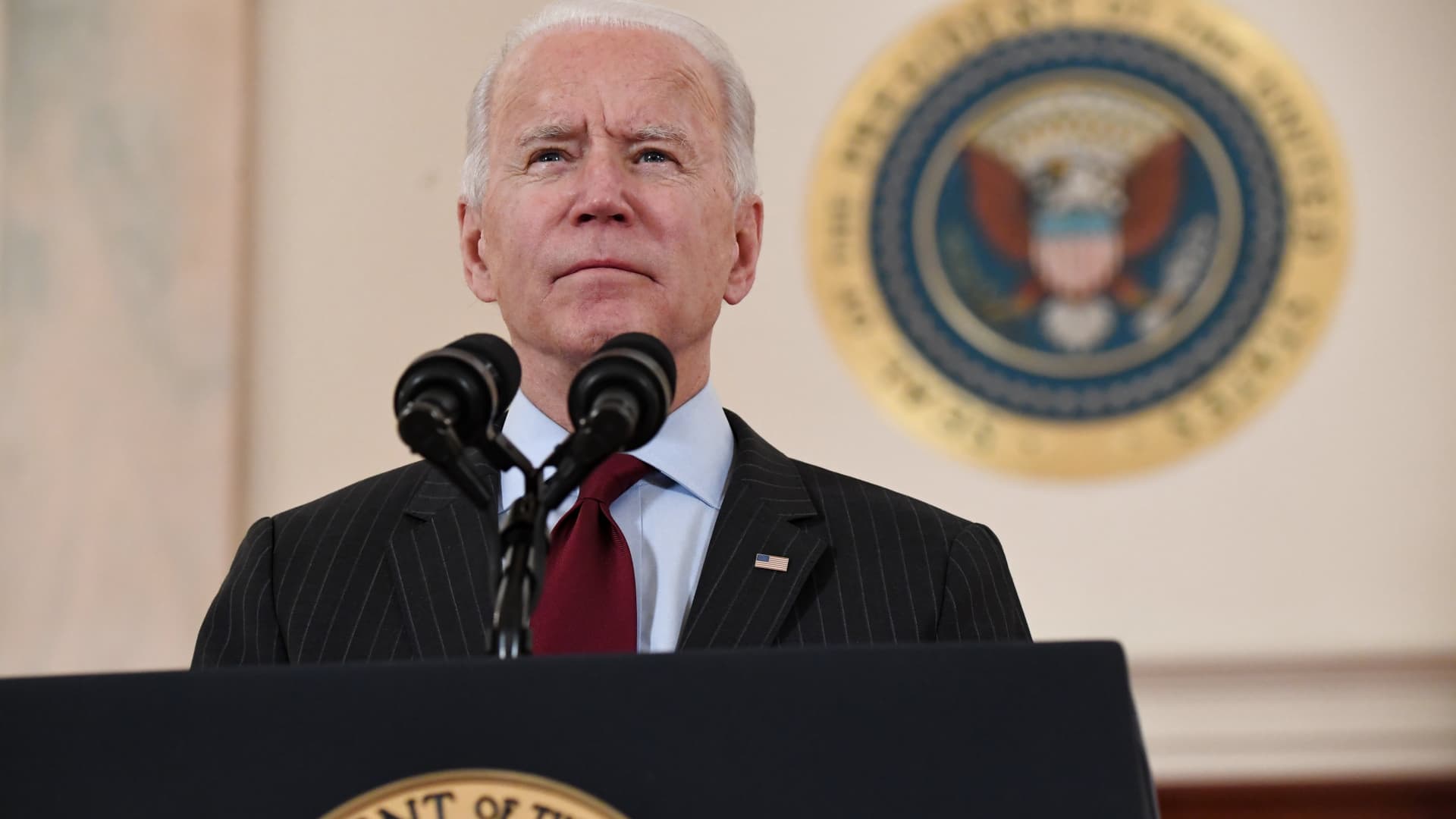 US President Joe Biden speaks about lives lost to Covid after death toll passed 500,000, in the Cross Hall of the White House in Washington, DC, February 22, 2021.
