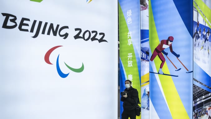 A journalist looks at a display at the exhibition center for the Beijing 2022 Winter Olympics in Yaqing district on February 5, 2021 in Beijing, China.