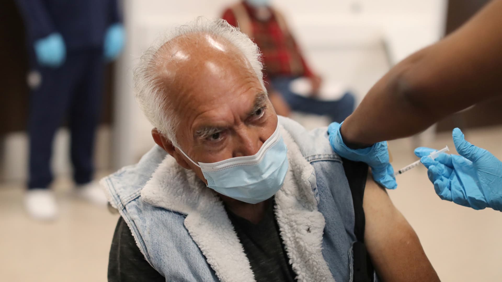 Jose Luis Hermosillo, 78, is given a coronavirus disease (COVID-19) vaccination at Martin Luther King Jr. Community Hospital in Willowbrook, Los Angeles, California, February 25, 2021.