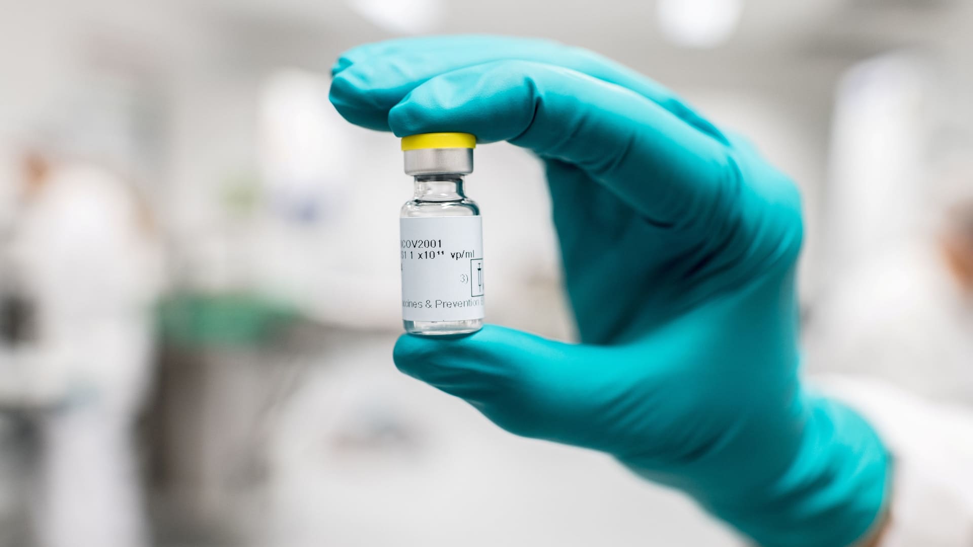 A lab worker holds a vial of Johnson & Johnson's Janssen coronavirus disease (COVID-19) vaccine.
