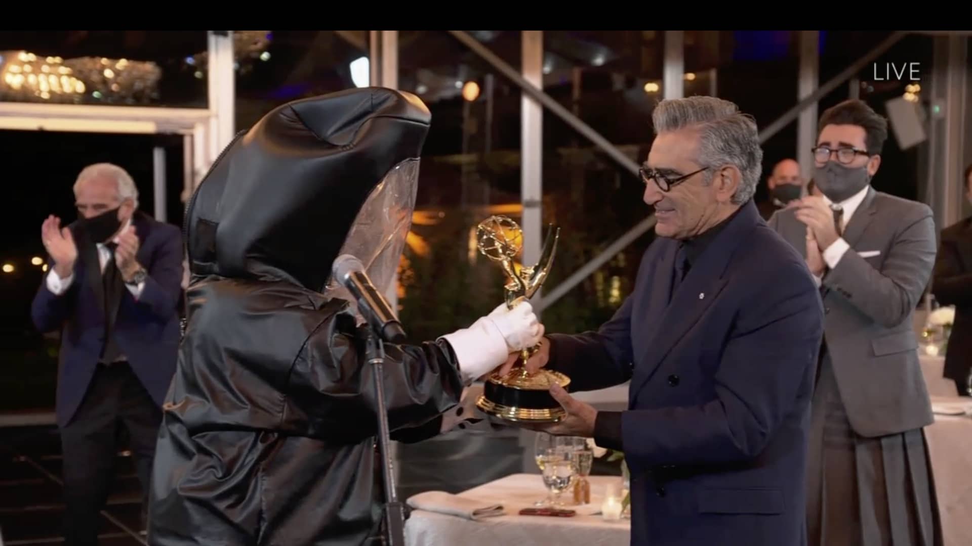 Eugene Levy receives his Emmy Award for lead actor in a comedy series during the September 20, 2020 ceremony.