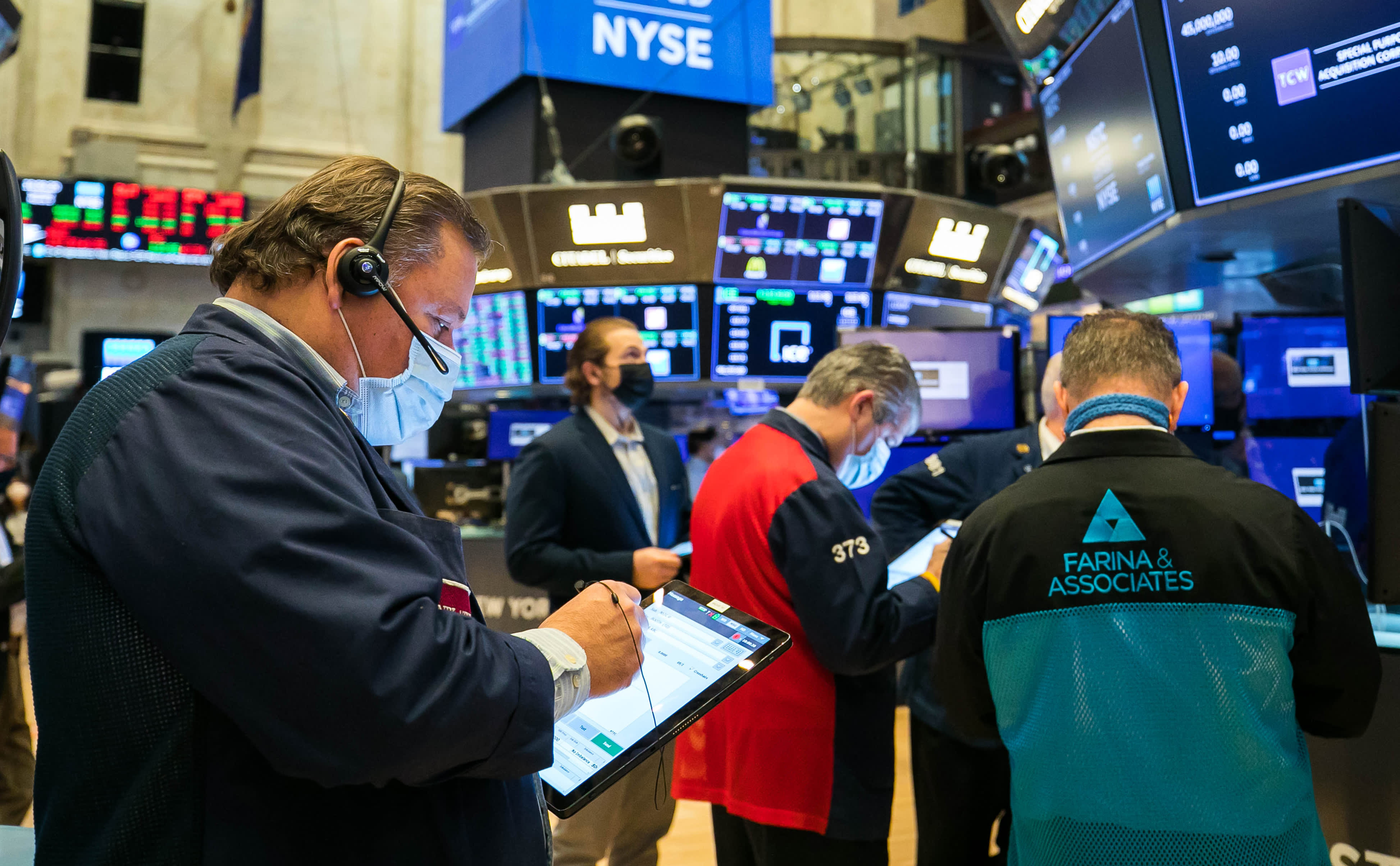 Stock futures are little changed after Dow, S&P closes in record